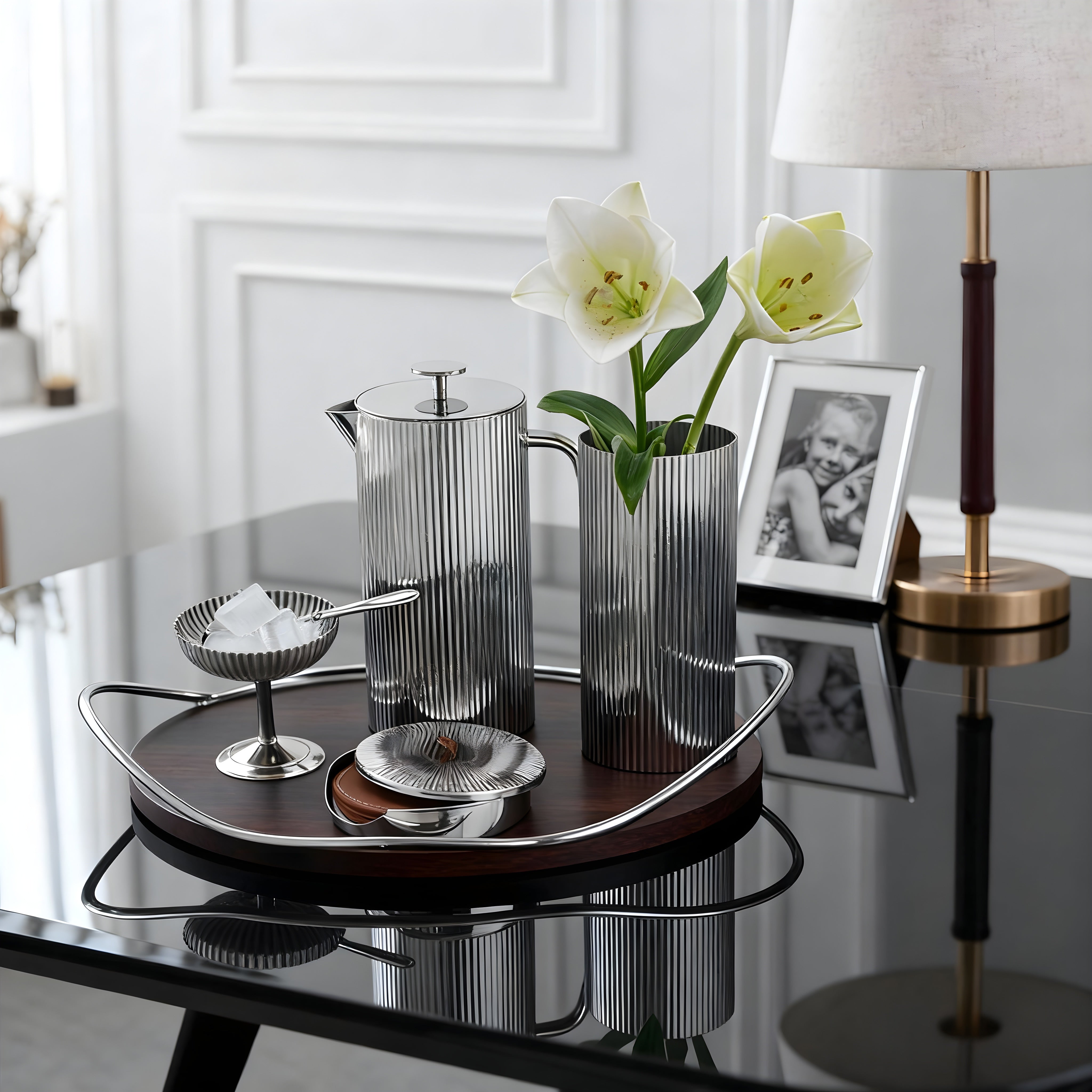 The Nordic Lines Set – Modern Nordic hosting set by Eloré featuring ribbed stainless vase, serving pitcher, and minimalist tray